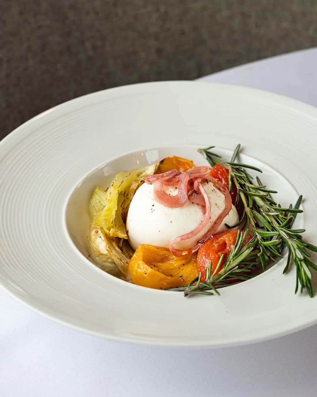 Burrata del Giorno — Pugliese burrata with heirloom tomatoes